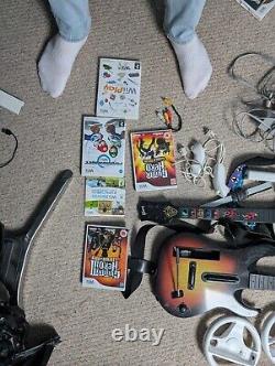 Wii + Games + Accessories + All working cables Complete Set